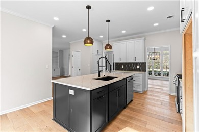 RARE FIND! This Eagle Watch home has 2 TRUE MASTER BEDROOMS with on Canongate At Eagle Watch Golf Club in Georgia - for sale on GolfHomes.com, golf home, golf lot