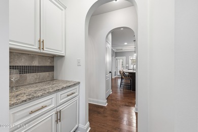 Nestled in the prestigious gated golf course community of Mid on Mid South Club in North Carolina - for sale on GolfHomes.com, golf home, golf lot