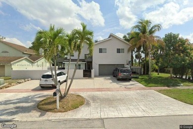 Stunning 5-Bed, 4.5-Bath courtyard pool home featuring vaulted on Jacaranda Golf Club in Florida - for sale on GolfHomes.com, golf home, golf lot