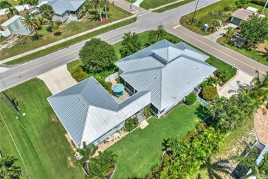 GRACEFUL ON WEST GRACE STREET, this custom designed 2016 Key on Twin Isles Country Club in Florida - for sale on GolfHomes.com, golf home, golf lot