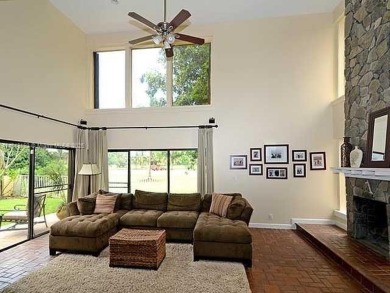 Stunning 5-Bed, 4.5-Bath courtyard pool home featuring vaulted on Jacaranda Golf Club in Florida - for sale on GolfHomes.com, golf home, golf lot