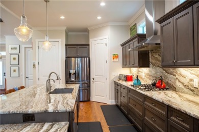 GRACEFUL ON WEST GRACE STREET, this custom designed 2016 Key on Twin Isles Country Club in Florida - for sale on GolfHomes.com, golf home, golf lot