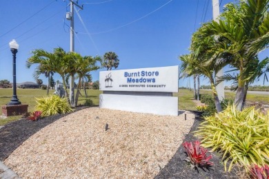 JUST REDUCED $20K - Assumable 3.25% VA Loan! Move-In Ready on Seminole Lakes Country Club in Florida - for sale on GolfHomes.com, golf home, golf lot