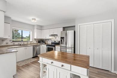 Enjoy easy living in Martin Downs Country Club, highly sought on Martin Downs Country Club in Florida - for sale on GolfHomes.com, golf home, golf lot