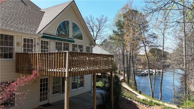 Welcome to this Windward Lake Community 5 bedroom and on The Golf Club of Georgia in Georgia - for sale on GolfHomes.com, golf home, golf lot