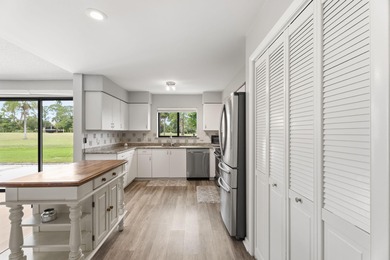 Enjoy easy living in Martin Downs Country Club, highly sought on Martin Downs Country Club in Florida - for sale on GolfHomes.com, golf home, golf lot