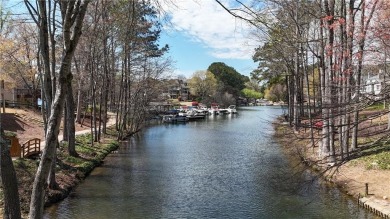 Welcome to this Windward Lake Community 5 bedroom and on The Golf Club of Georgia in Georgia - for sale on GolfHomes.com, golf home, golf lot