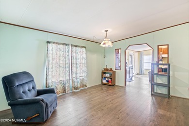 Charming 3 bedroom beach bungalow located in the town of Sunset on Pearl Golf Links in North Carolina - for sale on GolfHomes.com, golf home, golf lot