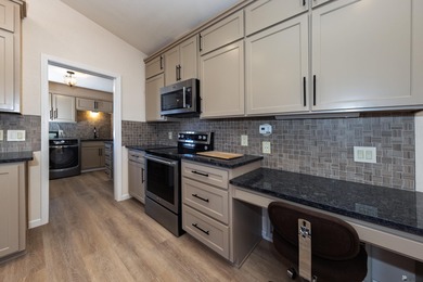 This beautiful home is ideally situated on the Mesa Del Sol Golf on Mesa Del Sol Golf Club in Arizona - for sale on GolfHomes.com, golf home, golf lot