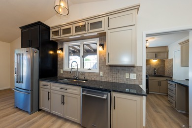 This beautiful home is ideally situated on the Mesa Del Sol Golf on Mesa Del Sol Golf Club in Arizona - for sale on GolfHomes.com, golf home, golf lot