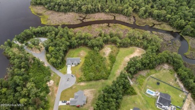 Discover the perfect blend of privacy and convenience with this on Silver Creek Golf Club in North Carolina - for sale on GolfHomes.com, golf home, golf lot