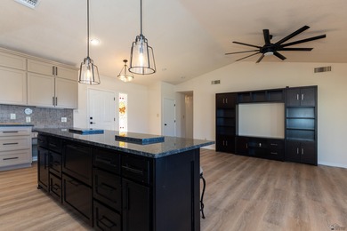 This beautiful home is ideally situated on the Mesa Del Sol Golf on Mesa Del Sol Golf Club in Arizona - for sale on GolfHomes.com, golf home, golf lot