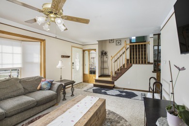 Charming home, that backs to the Mack Mayfield Municipal Golf on Westland Municipal Golf Course in Michigan - for sale on GolfHomes.com, golf home, golf lot