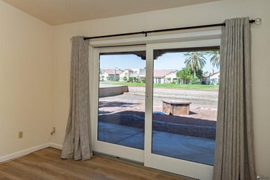 This beautiful home is ideally situated on the Mesa Del Sol Golf on Mesa Del Sol Golf Club in Arizona - for sale on GolfHomes.com, golf home, golf lot