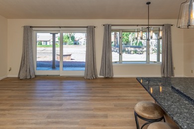 This beautiful home is ideally situated on the Mesa Del Sol Golf on Mesa Del Sol Golf Club in Arizona - for sale on GolfHomes.com, golf home, golf lot