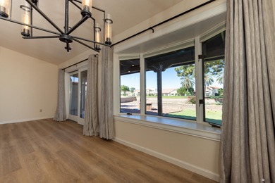 This beautiful home is ideally situated on the Mesa Del Sol Golf on Mesa Del Sol Golf Club in Arizona - for sale on GolfHomes.com, golf home, golf lot