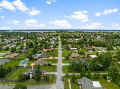Charming 3 Bedroom Home on Large Corner Lot in the Heart of Lynn on Panama Country Club in Florida - for sale on GolfHomes.com, golf home, golf lot