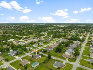 Charming 3 Bedroom Home on Large Corner Lot in the Heart of Lynn on Panama Country Club in Florida - for sale on GolfHomes.com, golf home, golf lot