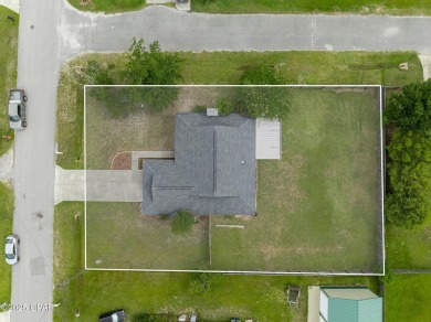 Charming 3 Bedroom Home on Large Corner Lot in the Heart of Lynn on Panama Country Club in Florida - for sale on GolfHomes.com, golf home, golf lot