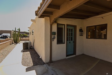 This beautiful home is ideally situated on the Mesa Del Sol Golf on Mesa Del Sol Golf Club in Arizona - for sale on GolfHomes.com, golf home, golf lot