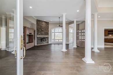 Executive-style living on the 9th hole of Black Creek Golf on Black Creek Golf Club in Georgia - for sale on GolfHomes.com, golf home, golf lot