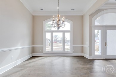 Executive-style living on the 9th hole of Black Creek Golf on Black Creek Golf Club in Georgia - for sale on GolfHomes.com, golf home, golf lot