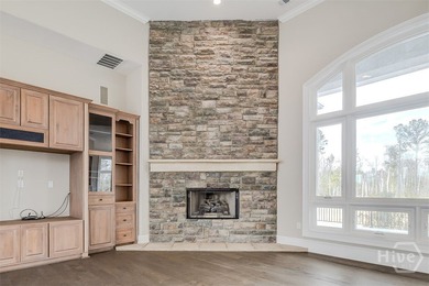 Executive-style living on the 9th hole of Black Creek Golf on Black Creek Golf Club in Georgia - for sale on GolfHomes.com, golf home, golf lot