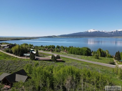 Lakeview lot with stunning views of the pristine Henry's Lake on Island Park Village Resort Golf Course in Idaho - for sale on GolfHomes.com, golf home, golf lot