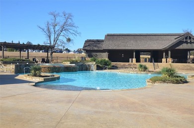 Discover resort-style living at 970 Pronghorn Drive, Gordonville on Rock Creek Golf Club in Texas - for sale on GolfHomes.com, golf home, golf lot