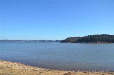 Discover resort-style living at 970 Pronghorn Drive, Gordonville on Rock Creek Golf Club in Texas - for sale on GolfHomes.com, golf home, golf lot