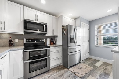 LOVE where you live in this beautifully renovated 4th Floor on Palm-Aire Country Club and Resort - Palms in Florida - for sale on GolfHomes.com, golf home, golf lot