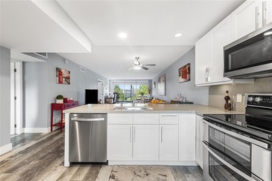 LOVE where you live in this beautifully renovated 4th Floor on Palm-Aire Country Club and Resort - Palms in Florida - for sale on GolfHomes.com, golf home, golf lot