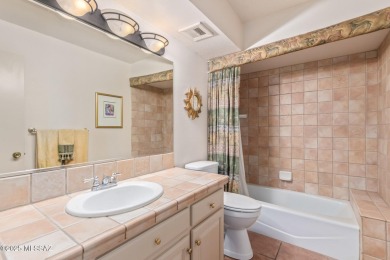 Tucked in a gated 55+ community along the OMNI Tucson National on Omni Tucson National Golf Resort and Spa - Catalina in Arizona - for sale on GolfHomes.com, golf home, golf lot