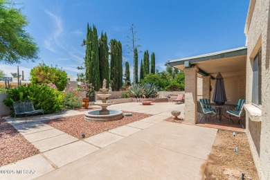 Tucked in a gated 55+ community along the OMNI Tucson National on Omni Tucson National Golf Resort and Spa - Catalina in Arizona - for sale on GolfHomes.com, golf home, golf lot
