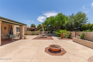 Tucked in a gated 55+ community along the OMNI Tucson National on Omni Tucson National Golf Resort and Spa - Catalina in Arizona - for sale on GolfHomes.com, golf home, golf lot