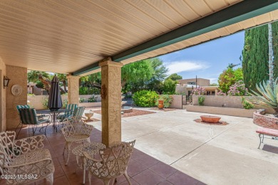 Tucked in a gated 55+ community along the OMNI Tucson National on Omni Tucson National Golf Resort and Spa - Catalina in Arizona - for sale on GolfHomes.com, golf home, golf lot