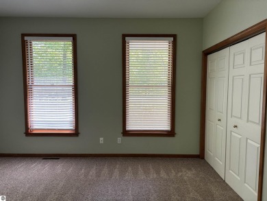 This beautiful custom built home offers 3 bedrooms/3 bathrooms on Singing Bridge Golf Course in Michigan - for sale on GolfHomes.com, golf home, golf lot