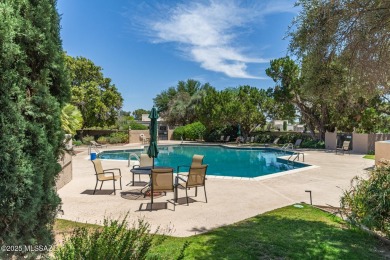 Tucked in a gated 55+ community along the OMNI Tucson National on Omni Tucson National Golf Resort and Spa - Catalina in Arizona - for sale on GolfHomes.com, golf home, golf lot