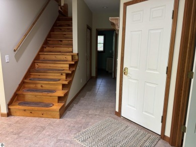 This beautiful custom built home offers 3 bedrooms/3 bathrooms on Singing Bridge Golf Course in Michigan - for sale on GolfHomes.com, golf home, golf lot