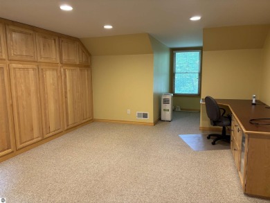 This beautiful custom built home offers 3 bedrooms/3 bathrooms on Singing Bridge Golf Course in Michigan - for sale on GolfHomes.com, golf home, golf lot