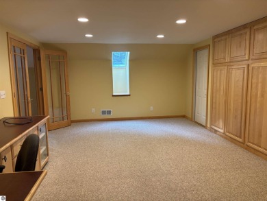 This beautiful custom built home offers 3 bedrooms/3 bathrooms on Singing Bridge Golf Course in Michigan - for sale on GolfHomes.com, golf home, golf lot