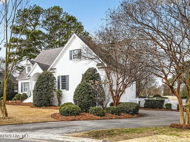 Situated on a quiet cul-de-sac overlooking the 9th tee of on Greenville Country Club in North Carolina - for sale on GolfHomes.com, golf home, golf lot