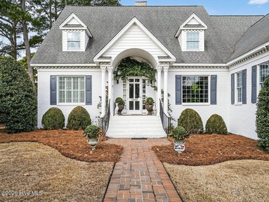 Situated on a quiet cul-de-sac overlooking the 9th tee of on Greenville Country Club in North Carolina - for sale on GolfHomes.com, golf home, golf lot