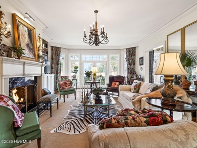 Situated on a quiet cul-de-sac overlooking the 9th tee of on Greenville Country Club in North Carolina - for sale on GolfHomes.com, golf home, golf lot