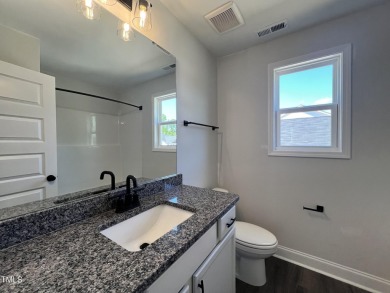 Schedule your tour of this beautiful new home in Clayton's on Riverwood Golf and Athletic Club in North Carolina - for sale on GolfHomes.com, golf home, golf lot