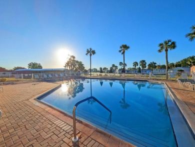 PRICE DROP! Welcome to this charming well maintained and on Lake Henry Golf Club in Florida - for sale on GolfHomes.com, golf home, golf lot