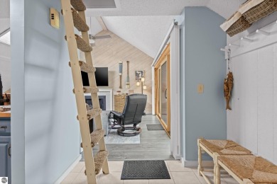 This studio condo offers stunning Lake Bellaire and sunset views on Shanty Creek Golf Course in Michigan - for sale on GolfHomes.com, golf home, golf lot