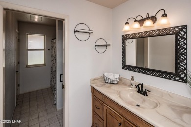 Located in the highly sought-after Residential Estates, this on London Bridge Golf Course in Arizona - for sale on GolfHomes.com, golf home, golf lot