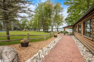 This studio condo offers stunning Lake Bellaire and sunset views on Shanty Creek Golf Course in Michigan - for sale on GolfHomes.com, golf home, golf lot