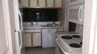 Indulge in comfort and convenience with this 2-bedroom on La Cita Country Club in Florida - for sale on GolfHomes.com, golf home, golf lot